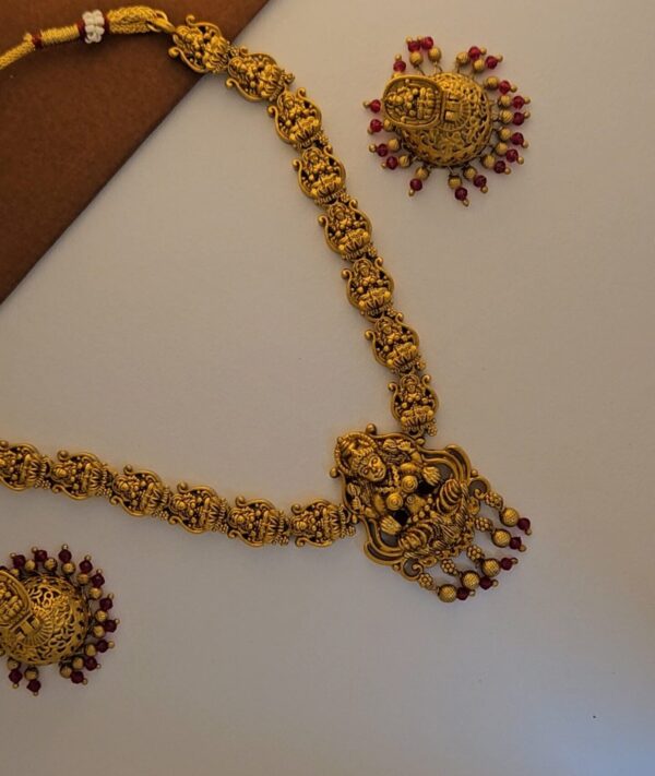 1000177992 (1) Lakshmi Pendant Haram & Earrings Set